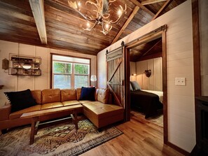 Tiny House...Big Comfort...spacious sectional w/ plenty of warm throws/pillows