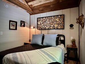 Cozy and comfortable queen bed with new pillowtop mattress. 