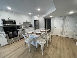 Open, fully stocked kitchen