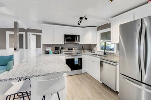 Full size appliances, cookware, dinnerware and basic electrical appliances and kitchen tools are provided for your convenience.