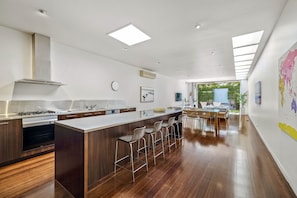 Open living, dining and lounge area. Guest review: "House very spacious"