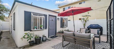 Adorable beach cottage with private outdoor patio. 