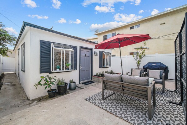 Adorable beach cottage with private outdoor patio. 