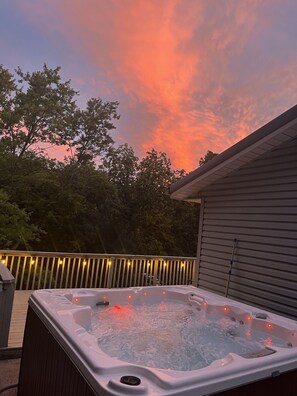 Hot tub on top deck overlooking the lake