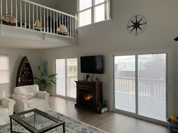 Open living room and fireplace.  Perfect for game/movie nights!