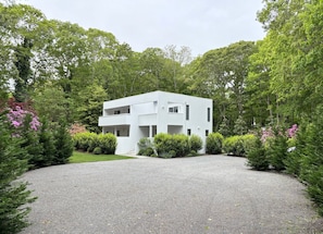 Newly renovated contemporary home, mature landscaping on 1 acre with fencing.