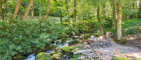 Relax and enjoy the soothing sounds from the roaring creek.