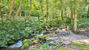 Relax and enjoy the soothing sounds from the roaring creek.