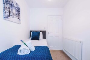 Bedroom 2 benefits from a comfortable single bed.
