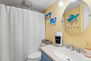 Some pretty artwork made by local artists decorate our bathroom.