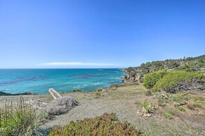 Enjoy our beautiful backyard with dramatic oceanfront view!