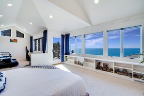 Upstair bedroom with dedicated workspace and amazing oceanfront view