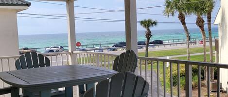 Relax on the spacious  2nd-floor covered balcony with amazing SUNSET GULF VIEWS!
