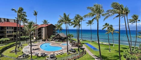 The view from the Lanai! One of two pool areas with 6 community grills.