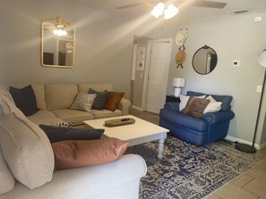 L-shaped couch with plenty of room for family & friends to relax and enjoy. 