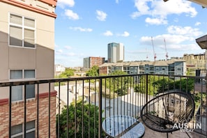 Patio with seating and a view