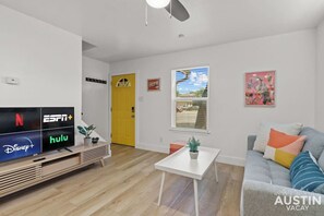 Living room with comfortable seating and smart tv