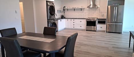 Dining room looking into kitchen.