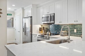 Stone counter tops and beautiful tile work