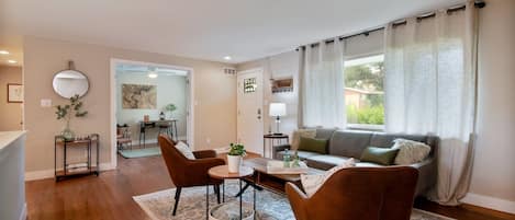 Welcome to our inviting retreat nestled in Arvada, CO!  Relax and unwind in the cozy living room, complete with plenty of seating and a flat screen TV.