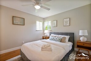 Escape to the airy master bedroom, complete with a comfortable queen-sized bed and nightstands.  Choose from five bedrooms, two of which have private ensuite bathrooms.