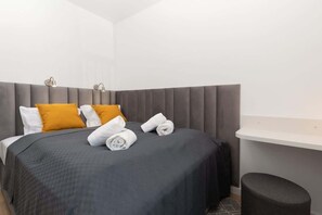 The cosy bedroom features a luxurious double bed.