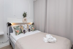 The cosy bedroom features a luxurious double bed.