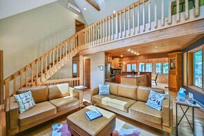 Living Room View of Loft and Kitchen