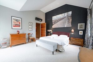 Bedroom 3 is a gorgeous room w/queen bed and high-vaulted ceiling