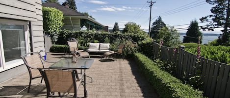 Private patio area with outdoor furniture, perfect to watch the sunsets!