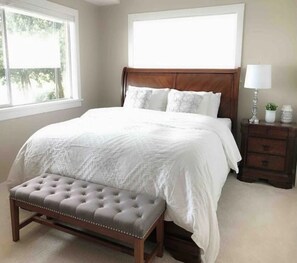 Master Bedroom with King  size Bed it looks out to the Puget Sound & Mountains
