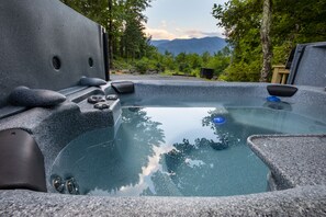 Hot tub with breathtaking mountain views.