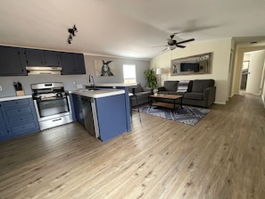 Living room and Kitchen area. (Microwave not pictured)