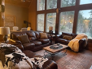 3 leather couches in the Living Room