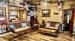 Living room with indoor porch swing.