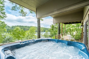Soak Away Your Cares… - What’s more pampering and indulgent than unwinding in a hot tub? Unwinding in a hot tub on a porch looking out among the treetops!