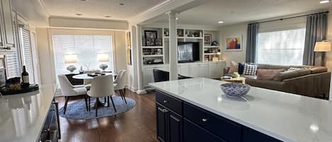 Kitchen opens into living area & dining area, island seating as well. 