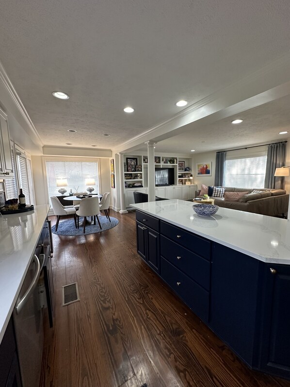 Kitchen opens into living area & dining area, island seating as well. 