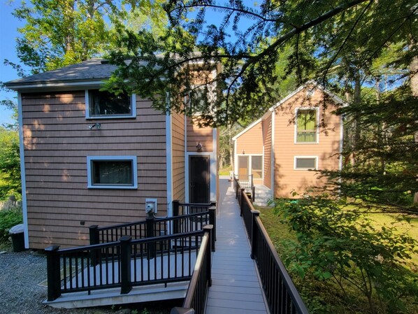 Ebb And Flow are two cottages connected by a deck