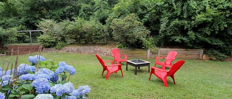 Large sunny and level backyard that is fully fenced for the pups or kiddos.