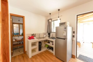 A compact kitchen with all the basic commodities