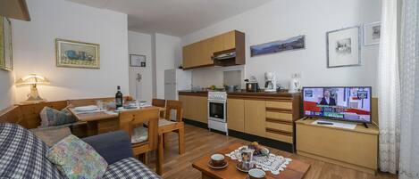 The cozy living room overlooking the kitchen