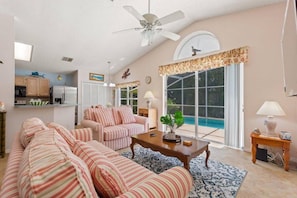 Main Living Area w/Sofa, Love Seat and Flat Screen TV