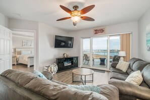 Living Room with Full Pull-Out Sofa Bed and Access to the large Balcony