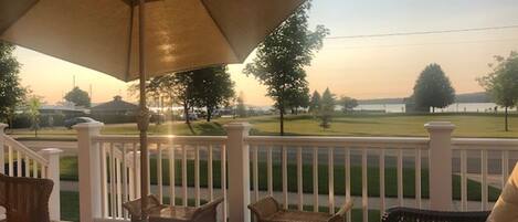 Spacious front porch overlooking Lake Charlevoix.
