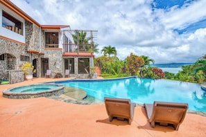 The clubhouse infinity pool is a fabulous spot to unwind. Lake and volcano views abound.