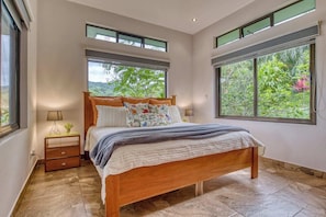 The King size bed is so comfy and the flora and fauna envelopes you from every window.