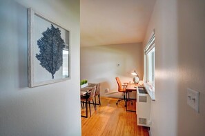 Entryway to apartment has additional closet for storage.