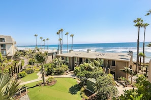 Amazing lofted views of the ocean waves with the iconic Oceanside Pier in the distance