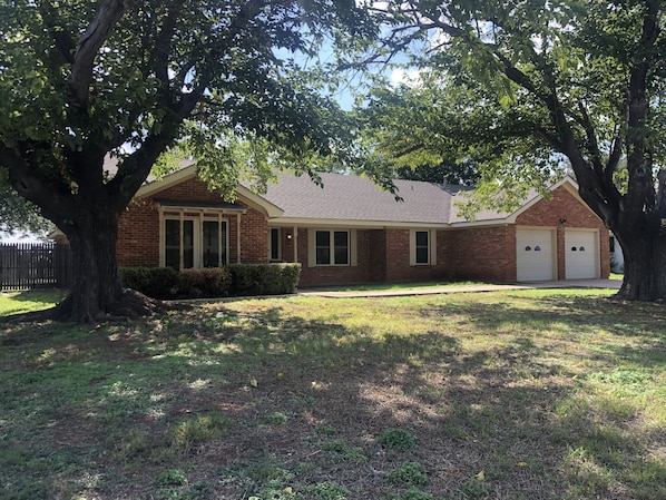 Front of house Large tree shaded lot on low traffic st